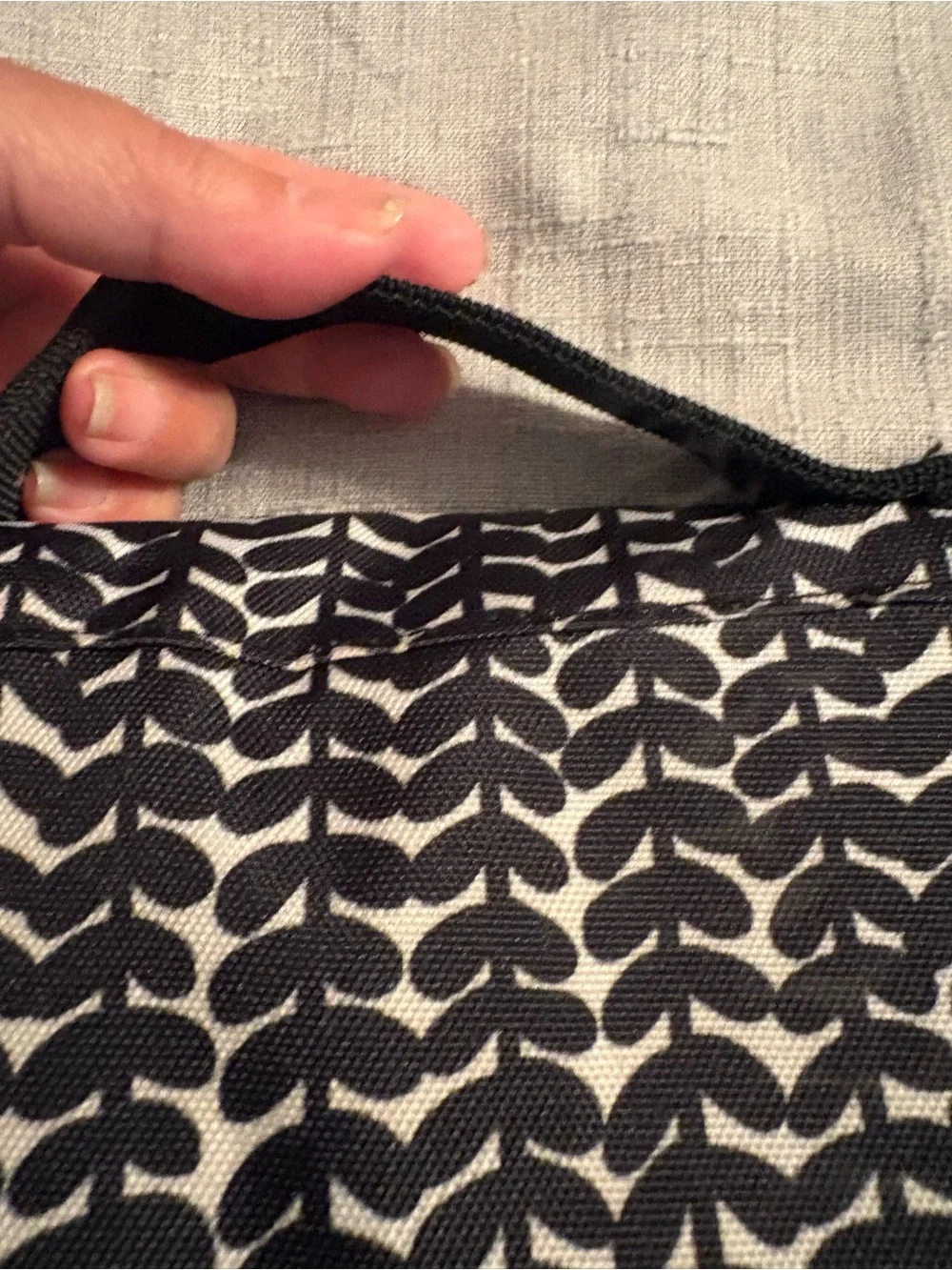 Skidaddle by Skip Hop Black & White Travel diaper bag with fold out changing pad